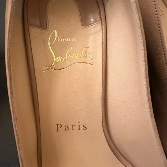 A authentic Christian Louboutin taupe pumps with gold studs