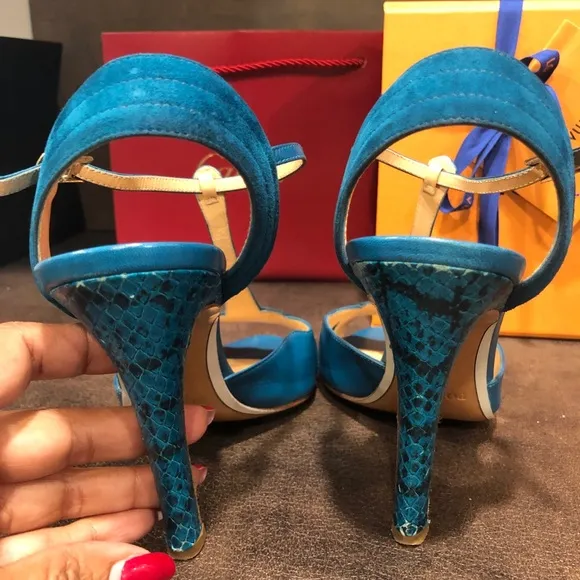 Authentic Pollini teal leather and suede heels.