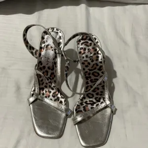 Bebe 8 silver leather soles leather heels not worn
