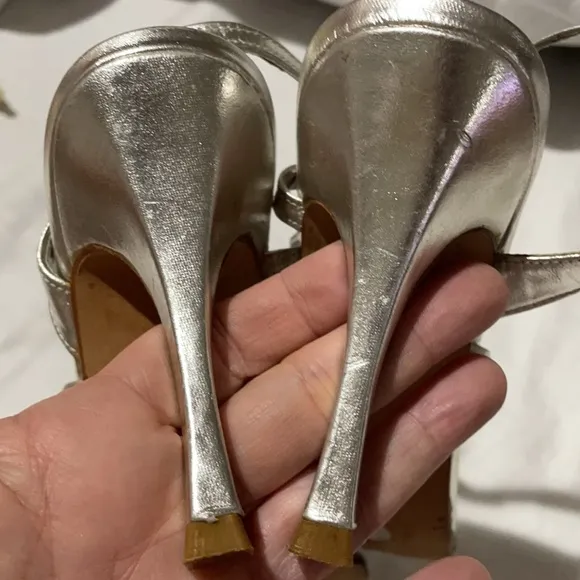 Bebe 8 silver leather soles leather heels not worn
