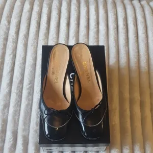 CHANEL Black Patent Leather Mules