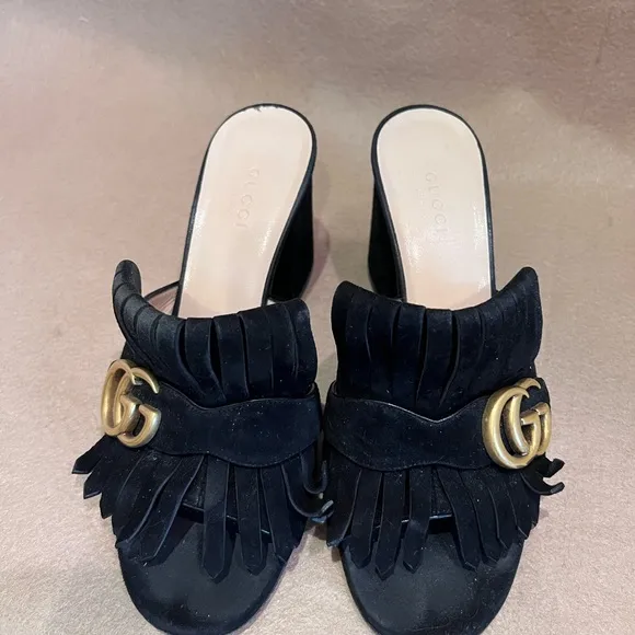 Gucci Black and Gold Mules with Textured Upper and Slip-On Design
