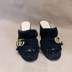 Gucci Black and Gold Mules with Textured Upper and Slip-On Design