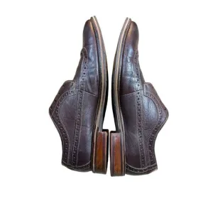 Johnston and Murphy wingtip dark brown dress shoes all leather with wooden heel.