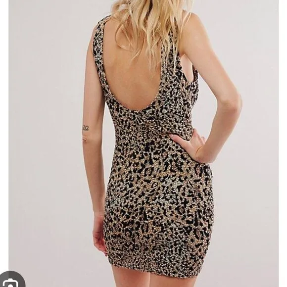 NEW Free People Marigold Mini Dress in Leopard Print Size Medium