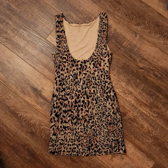NEW Free People Marigold Mini Dress in Leopard Print Size Medium