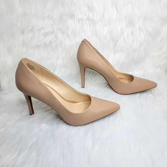 Nine West nude pointed toe stiletto heels.