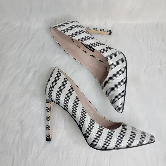 Nine West pointed toe stiletto heels.