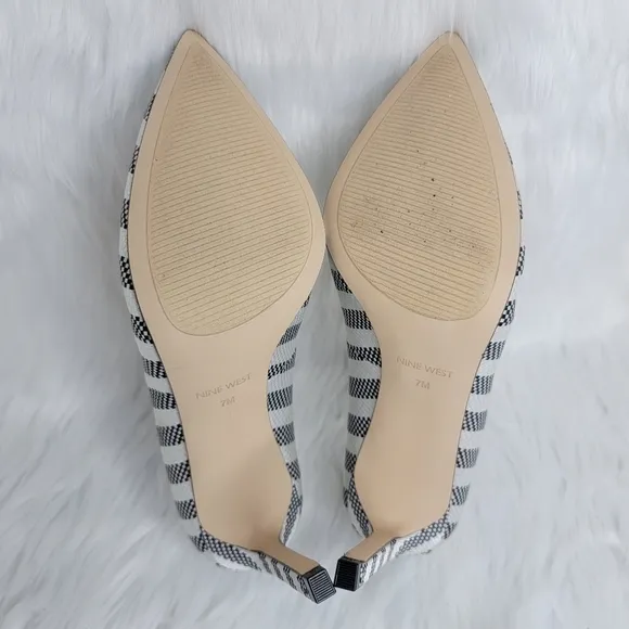 Nine West pointed toe stiletto heels.