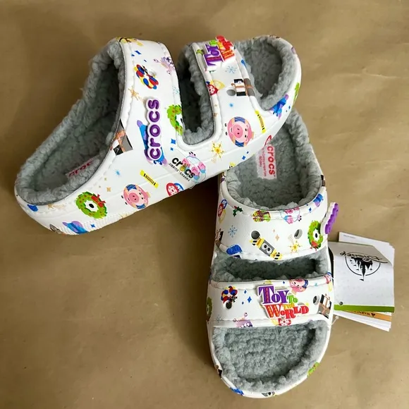 NWT Crocs Disney Parks Holiday Pixar Toy To The World White Slides Sandals