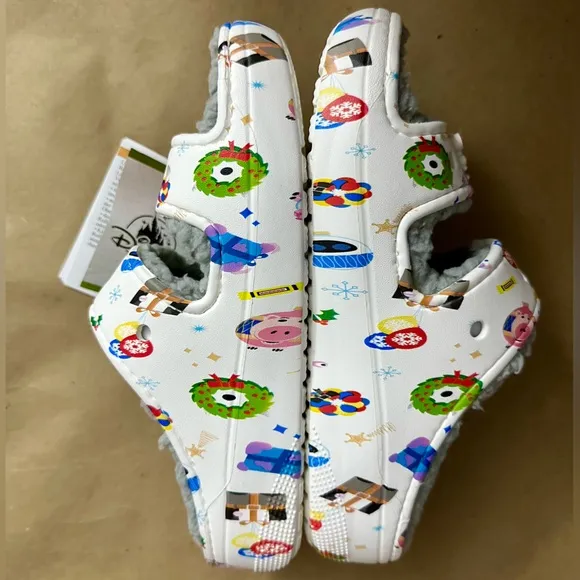 NWT Crocs Disney Parks Holiday Pixar Toy To The World White Slides Sandals