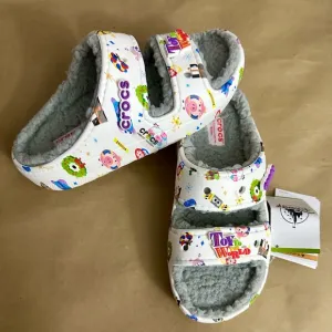 NWT Crocs Disney Parks Holiday Pixar Toy To The World White Slides Sandals