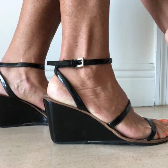 Prada patent leather sandals.