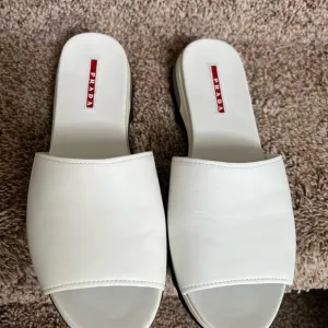Prada Women’s White Leather Slides