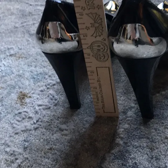 Stuart Weitzman patent pumps