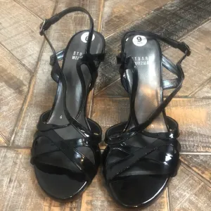 Stuart Weizmann patent leather strappy heels.