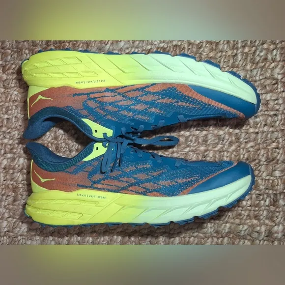 The HOKA Speedgoat 5 is a highly cushioned, technical trail running shoe designe
