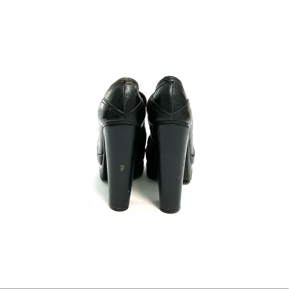 Vintage 1970s black leather platform loafer disco heels