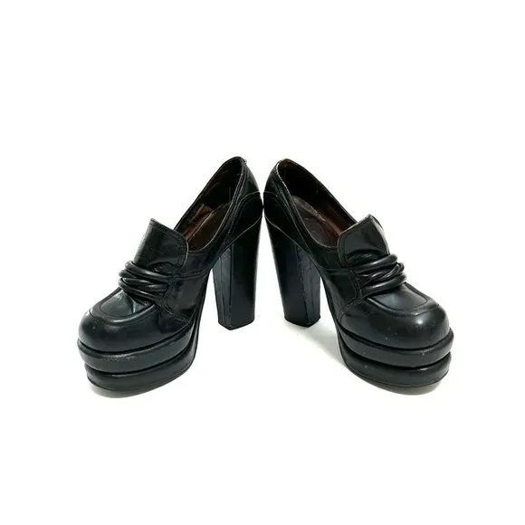 Vintage 1970s black leather platform loafer disco heels